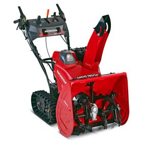Profesjonalna odśnieżarka Honda do usuwania śniegu z parkingów i terenów firmowych.